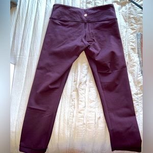 Size 6 lulu lemon plum colored leggings.